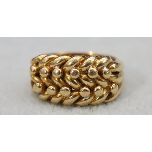 570 - An 18ct gold entwined ring, Size J/K, 13.1 grams