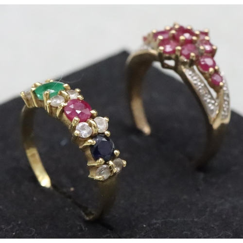 583 - An 18ct gold ladies' ring set with emerald, ruby, sapphire and clear stones, Size O/P and a 9ct gold... 