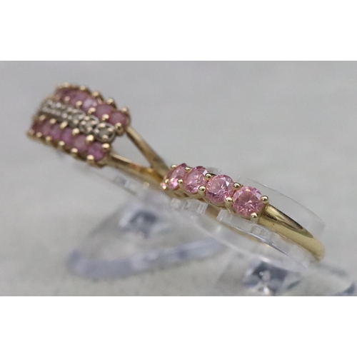 584 - A 14ct gold 5-stone ring set with pink coloured stones, Size N and a 9ct gold ring set with pink sto... 