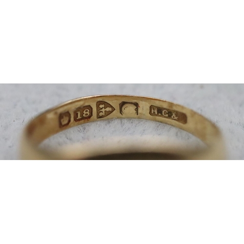 593 - A small 18ct gold signet ring, Size I, 2.6 grams