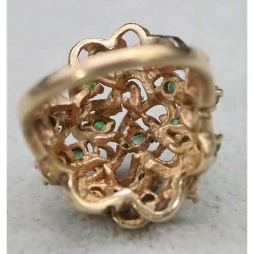 603 - A 9ct gold cluster ring set with various green stones, Size O/P, 8.8 grams gross