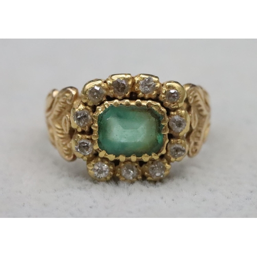 604 - A Georgian gold ring set with Peridot style green stone surrounded by 11 diamonds, Size Q/R, 6.9 gra... 