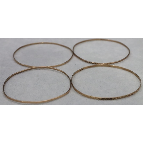 606 - 4 various 9ct gold bangles, 15.9 grams