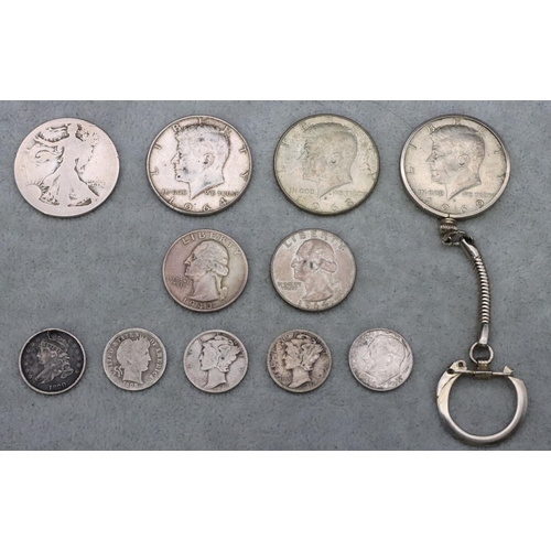 629 - 8 American silver coins with various dates and denominations, 73.8 grams