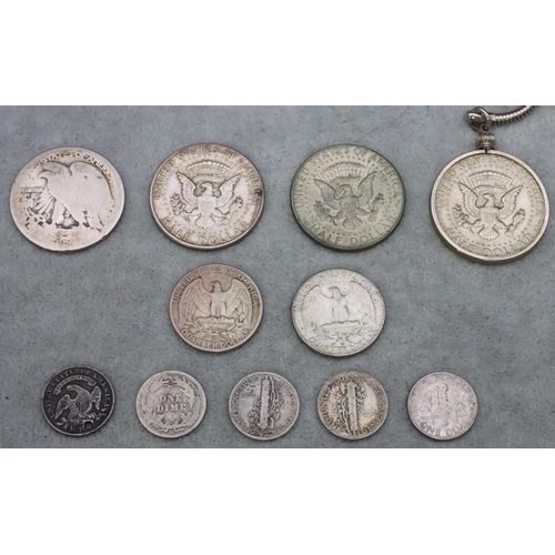 629 - 8 American silver coins with various dates and denominations, 73.8 grams