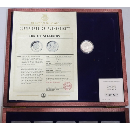 638 - A silver proof £20 coin with certificate and 10 gold plated Ingots WWII (boxed with certificates)