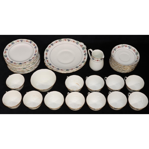 64 - An Adderleys Ltd tea service on white ground with multi-coloured floral and leaf rims, comprising of... 