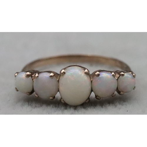 655 - A 9ct gold ladies' 5-stone opal ring, Size N, 2 grams gross