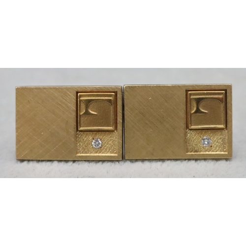 660 - A pair of 12ct gold plated rectangular shaped gentlemen's cufflinks set with small diamonds, cased