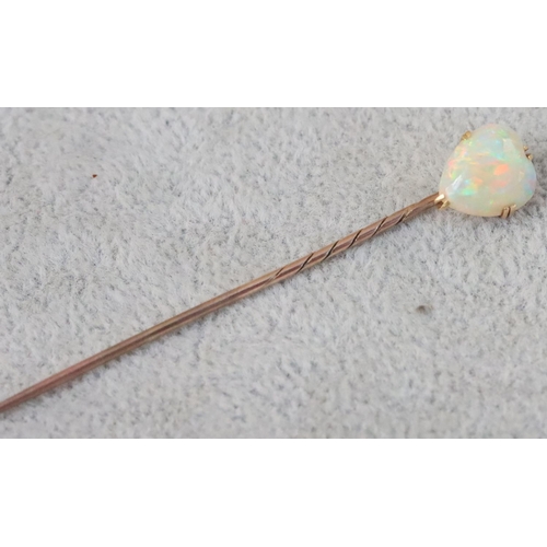 664 - A gold tie pin mounted with heart shaped opal, 1.9 grams gross, cased