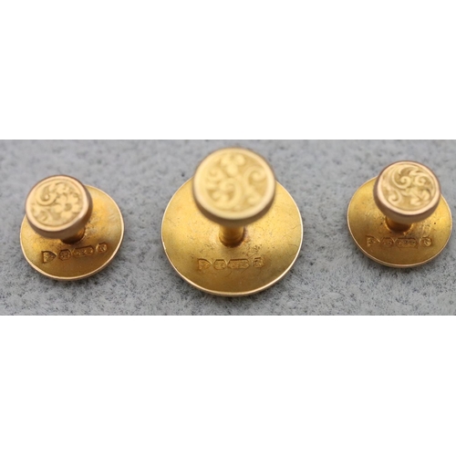 675 - A set of 3 15ct gold dress studs in fitted red leather case, 3.5 grams