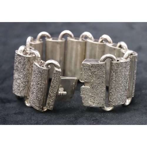 677 - A Victorian Continental silver coloured metal rectangular panel bracelet (1 link restored) with allo... 