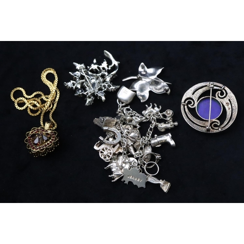 680 - A silver charm bracelet, 61.5 grams, 2 silver brooches, a further brooch and a gilt metal drop penda... 