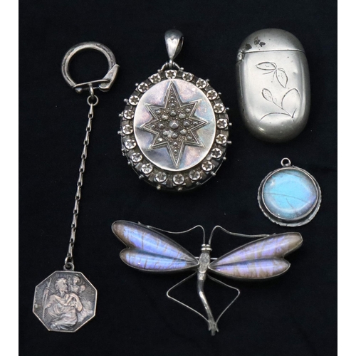 685 - A Sterling silver and butterfly brooch in the form of a dragonfly, an oval silver locket, a silver k... 