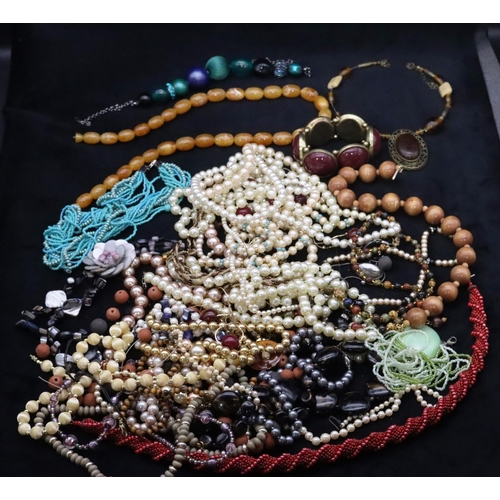 689 - A quantity of various costume bead necklaces, bracelets etc.