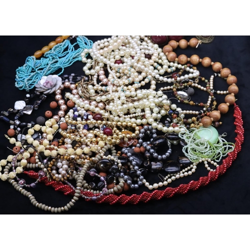 689 - A quantity of various costume bead necklaces, bracelets etc.