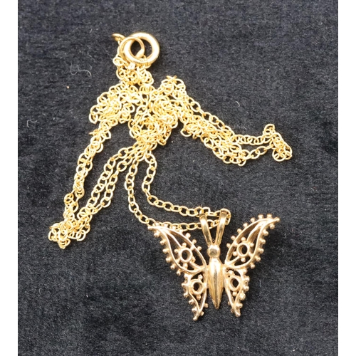 691 - A small 9ct gold pendant in the form of a butterfly with chain, 1.7 grams