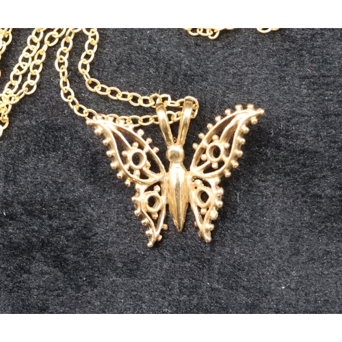 691 - A small 9ct gold pendant in the form of a butterfly with chain, 1.7 grams