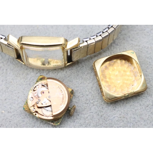 695 - An 18ct gold Schild square faced ladies' pocket watch with later plated expanding bracelet