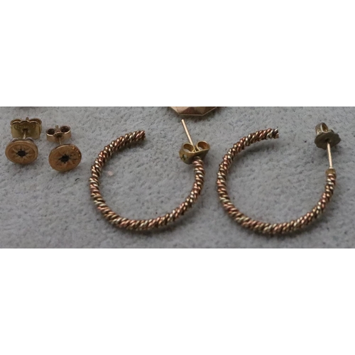 711 - A pair of 9ct gold hoop earrings and 4 further pairs of gold earrings, 8.4 grams gross