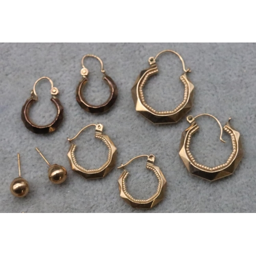 711 - A pair of 9ct gold hoop earrings and 4 further pairs of gold earrings, 8.4 grams gross