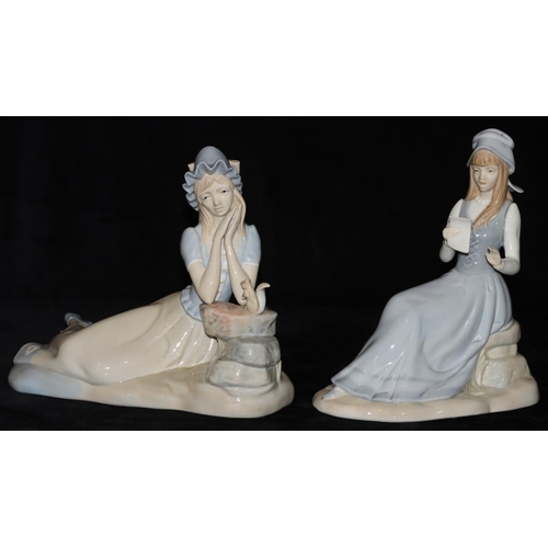 72 - 2 Lladro style figures of seated ladies, largest 23cm high (2)