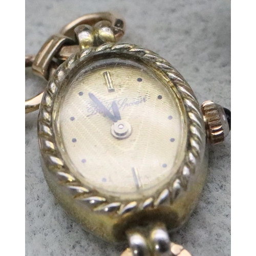 721 - A 9ct gold W Hinds circular wristwatch with later expanding strap bracelet (working) and 2 other wri... 