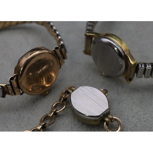 721 - A 9ct gold W Hinds circular wristwatch with later expanding strap bracelet (working) and 2 other wri... 