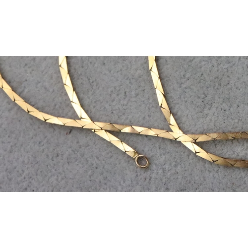 730 - A 9ct gold square linked chain, 52cm long, 7.9 grams