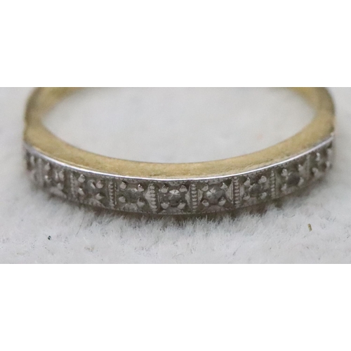 732 - An 18ct gold and platinum ladies' half eternity ring set with 9 diamonds, Size O/P, 2.5 grams gross