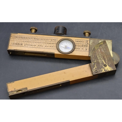 750 - SM, London gilt metal pocket thermometer/compass (a/f), in double hinged carrying case and a brass a... 