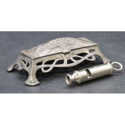 755 - An Art Deco pewter table top stamp box with hinged lid and embossed floral and leaf decoration, comp... 