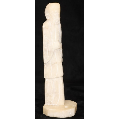 757 - An alabaster hardstone figure of a standing Oriental gentleman on square base, 34cm high