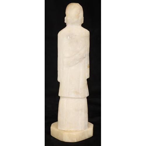 757 - An alabaster hardstone figure of a standing Oriental gentleman on square base, 34cm high