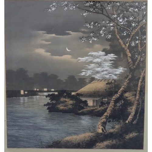 762 - An Oriental silk panel depicting buildings on river bank at moonlight with part highlighted decorati... 