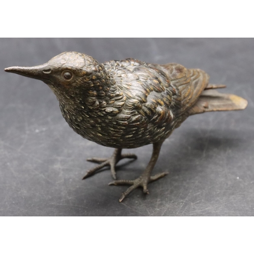 776 - An Austrian gold painted bronze figure of a bird (Starling), stamped, 17cm long, 10cm high