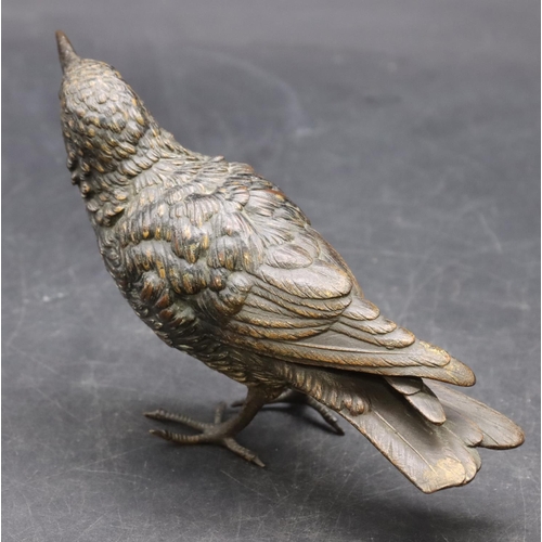 776 - An Austrian gold painted bronze figure of a bird (Starling), stamped, 17cm long, 10cm high