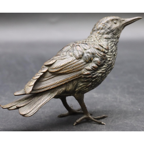 776 - An Austrian gold painted bronze figure of a bird (Starling), stamped, 17cm long, 10cm high