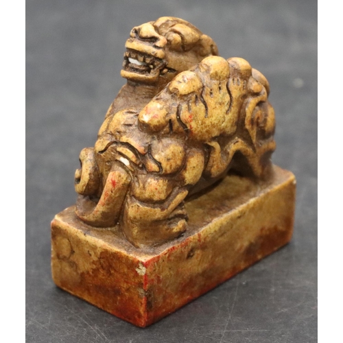 779 - A hardstone Oriental desk seal with animal motif, 5cm high