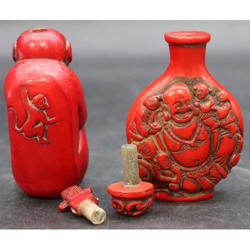 780 - A red lacquered scent bottle in the form of a seated monkey, 9cm high and another red lacquered scen... 