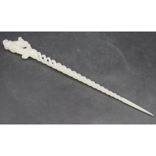 781 - A hardstone hairpin with animal motif, pierced and twist stem, 25cm long