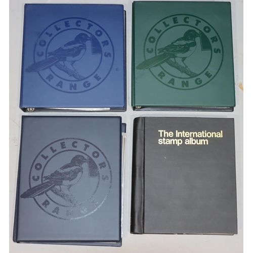 784 - A stamp album containing international stamps and 3 modern stamp albums containing Australian First ... 