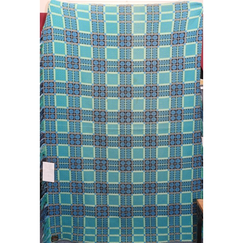 787 - A vintage Welsh blanket on lapis blue, green and black ground with geometric design, circa 1960's (P... 