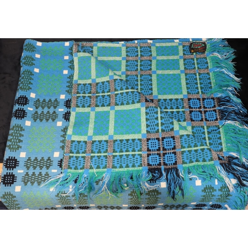 787 - A vintage Welsh blanket on lapis blue, green and black ground with geometric design, circa 1960's (P... 