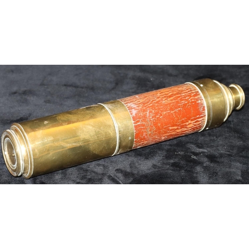 791 - A brass 4-sectioned telescope, 77cm long open, 30cm long closed