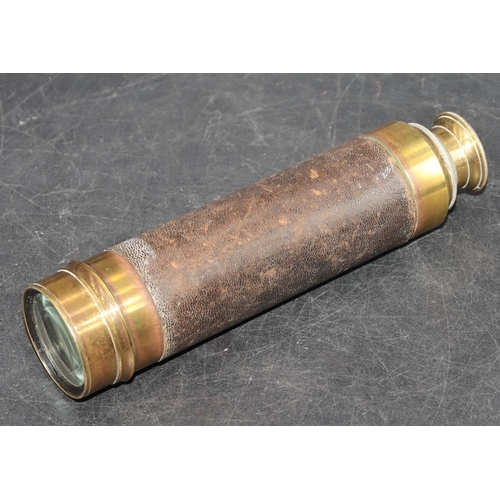 793 - A 4-fold brass and leather telescope, 42.5cm long open, 15.5cm closed