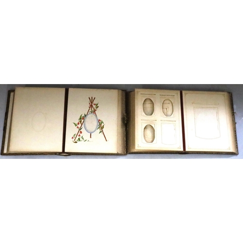 795 - A 19th Century leather photograph album with gilt decoration and lockable clasp (no key) enclosing p... 