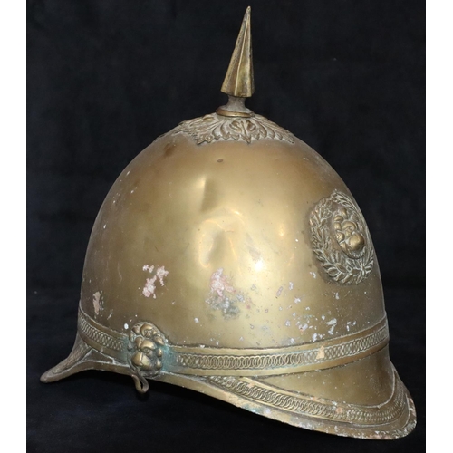 799 - A Prussian brass helmet with spike top (no leather straps or inner padding), 26cm high