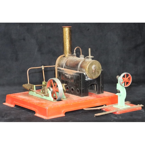 802 - A stationary steam model on red square base, 21cm high (2)