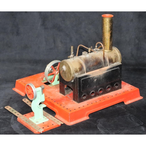 802 - A stationary steam model on red square base, 21cm high (2)